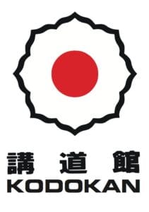 Kodokan Judo Institute logo – Jiu Jitsu San Diego, CA Symbol of the Kodokan Judo Institute featuring a red circle within a stylized black outline, reflecting the origin and tradition of Japanese Judo – Jiu Jitsu San Diego, CA