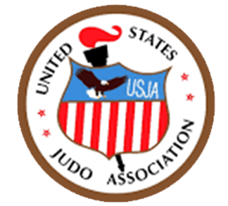 United States Judo Association logo – Jiu Jitsu San Diego, CA Emblem of the United States Judo Association featuring a red, white, and blue shield with stars and stripes symbolizing American Judo heritage – Jiu Jitsu San Diego, CA
